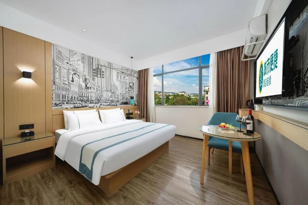 Bed in City Comfort Inn Shaoguan Biguiyuan Phoenix City Gold Village