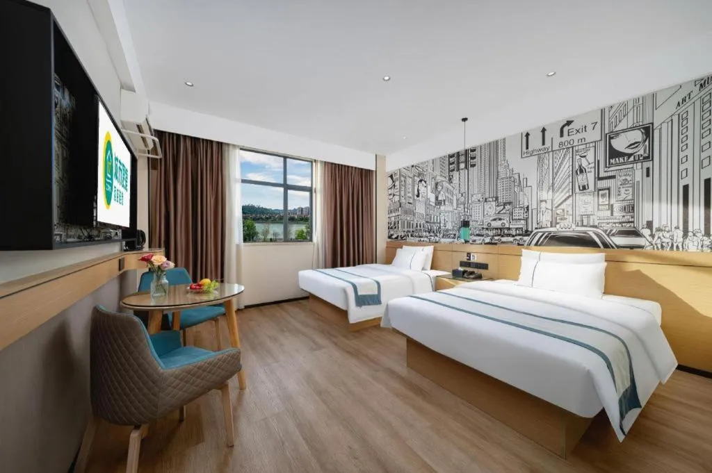 Bed in City Comfort Inn Shaoguan Biguiyuan Phoenix City Gold Village