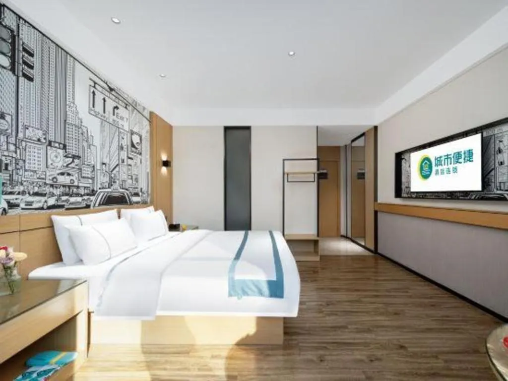 Bed in City Comfort Inn Shaoguan Biguiyuan Phoenix City Gold Village