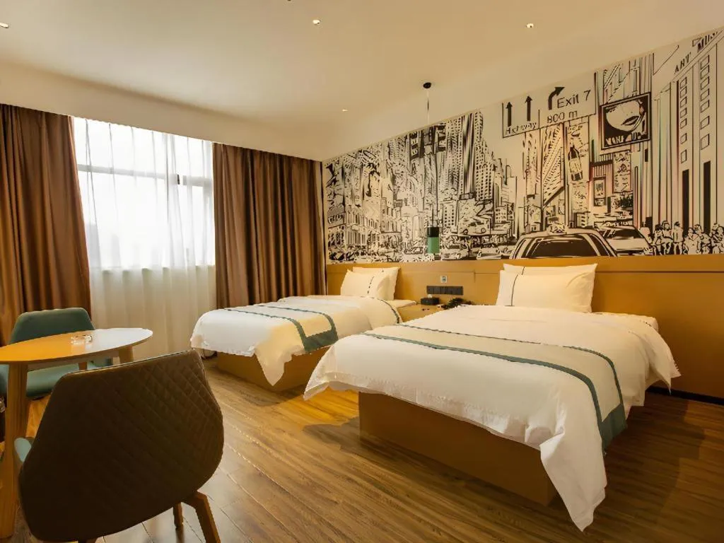 Bed in City Comfort Inn Shaoguan Biguiyuan Phoenix City Gold Village