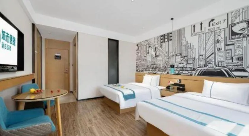 Bed in City Comfort Inn Shaoguan Biguiyuan Phoenix City Gold Village