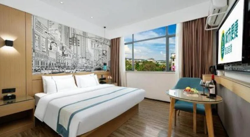 Bed in City Comfort Inn Shaoguan Biguiyuan Phoenix City Gold Village