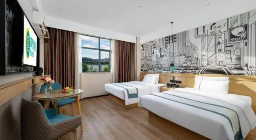 Bed in City Comfort Inn Shaoguan Biguiyuan Phoenix City Gold Village