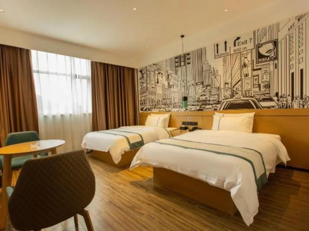 Bed in City Comfort Inn Shaoguan Biguiyuan Phoenix City Gold Village