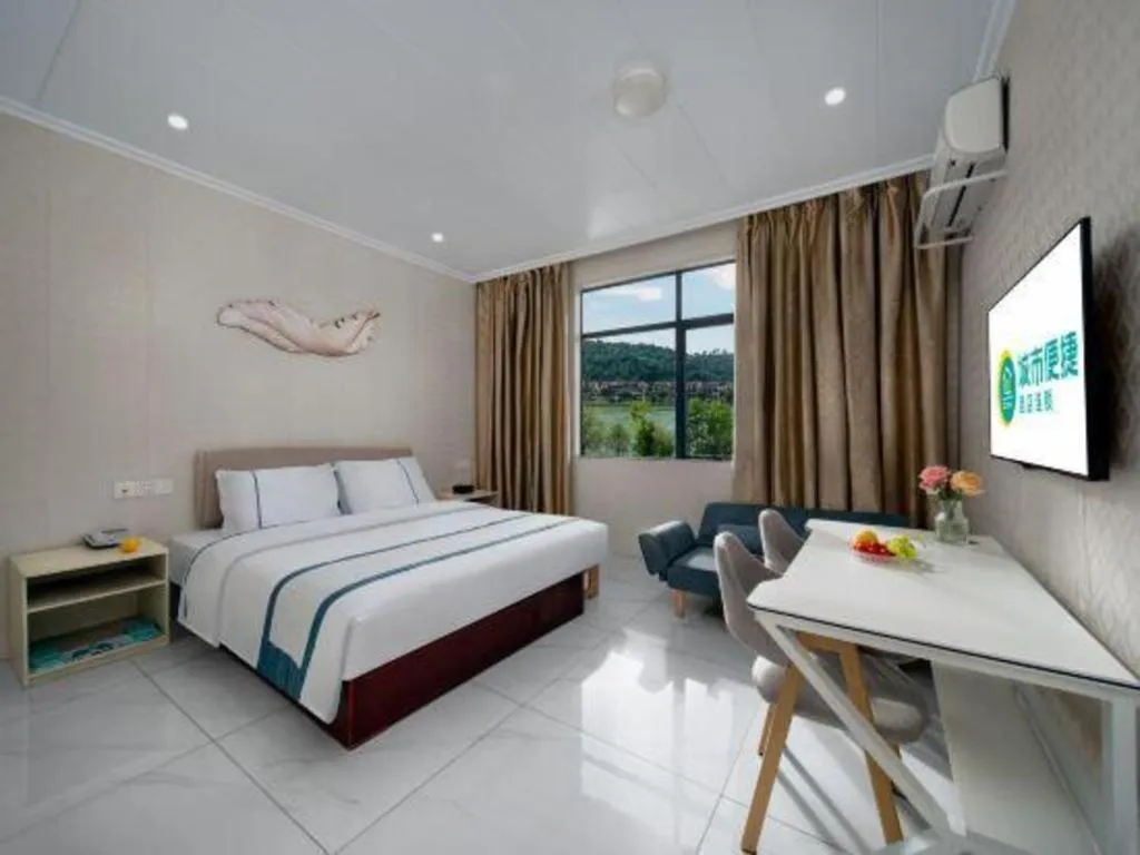 Bed in City Comfort Inn Shaoguan Biguiyuan Phoenix City Gold Village