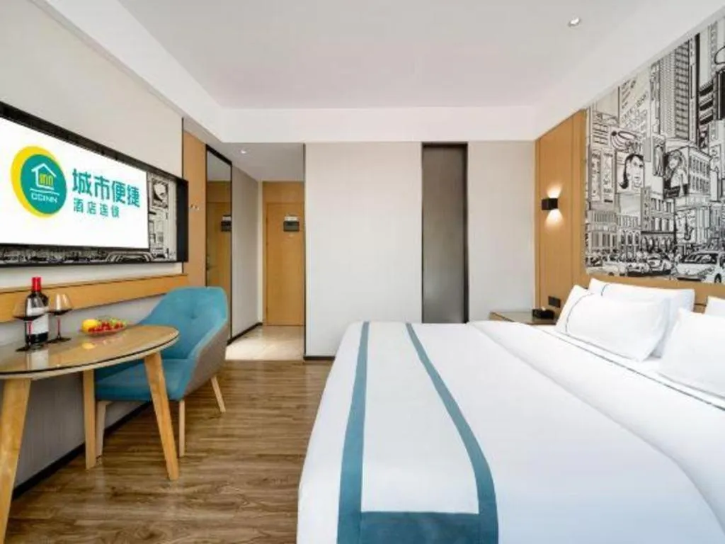 Bed in City Comfort Inn Shaoguan Biguiyuan Phoenix City Gold Village