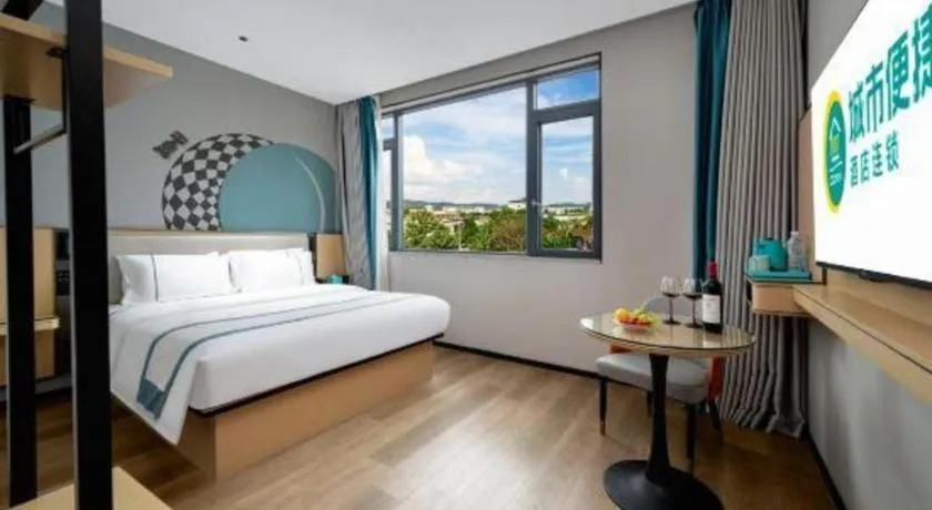 Bed in City Comfort Inn Shaoguan Biguiyuan Phoenix City Gold Village