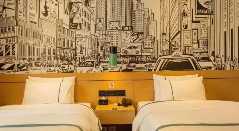 Bed in City Comfort Inn Shaoguan Biguiyuan Phoenix City Gold Village