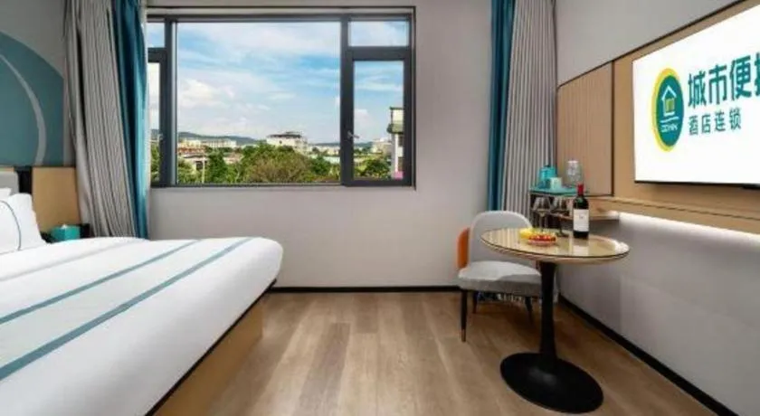 Bed in City Comfort Inn Shaoguan Biguiyuan Phoenix City Gold Village