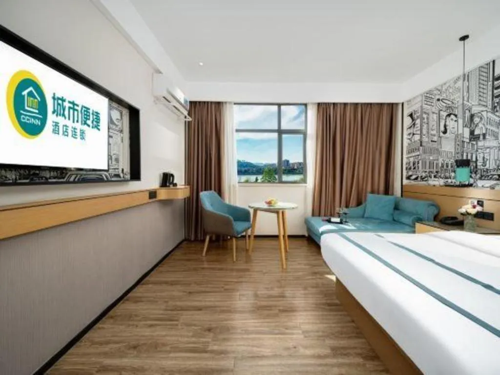 Bed in City Comfort Inn Shaoguan Biguiyuan Phoenix City Gold Village