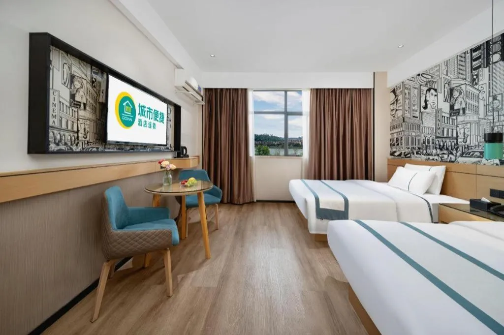 Bed in City Comfort Inn Shaoguan Biguiyuan Phoenix City Gold Village