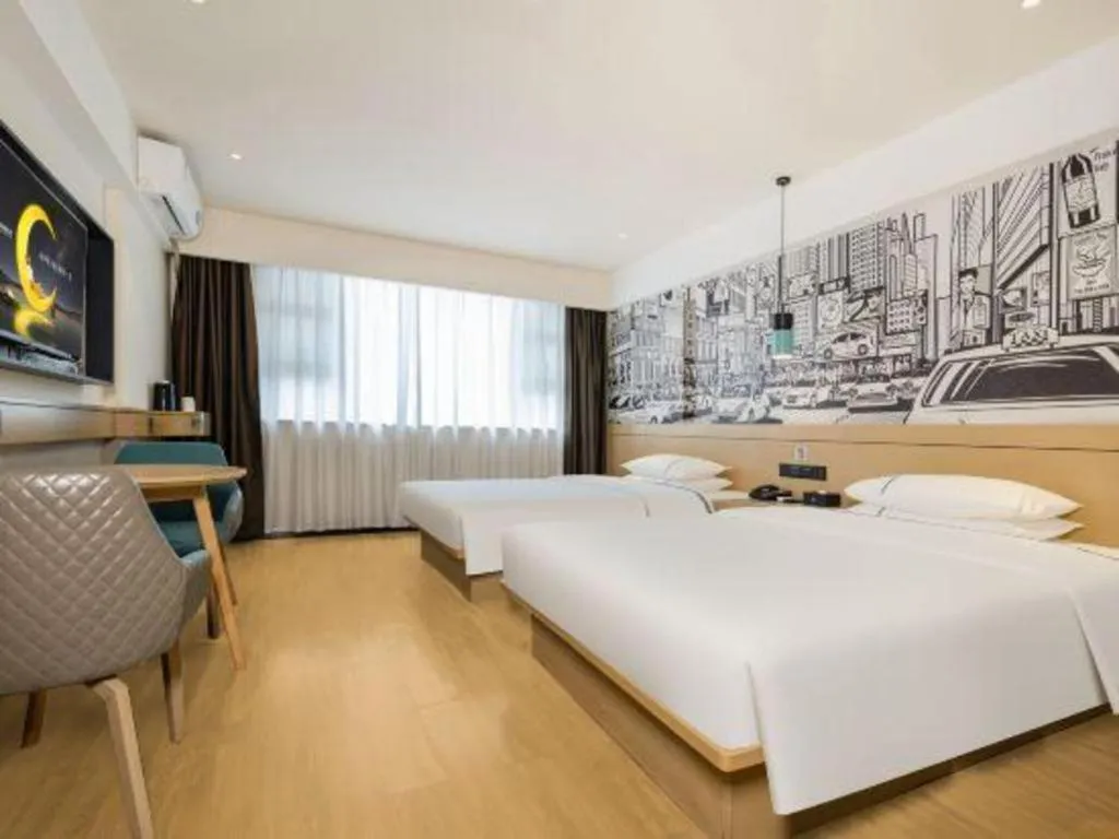 Bed in City Comfort Inn Wuzhou Sun Plaza Wanda