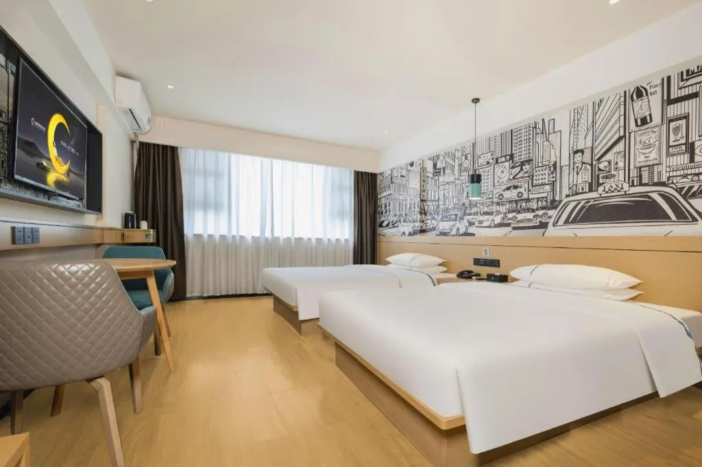 Bed in City Comfort Inn Wuzhou Sun Plaza Wanda