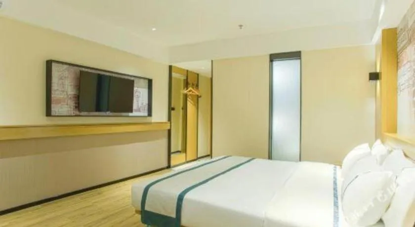 Bed in City Comfort Inn Wuzhou Sun Plaza Wanda