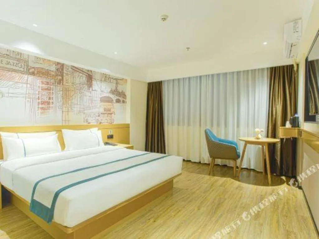 Bed in City Comfort Inn Wuzhou Sun Plaza Wanda