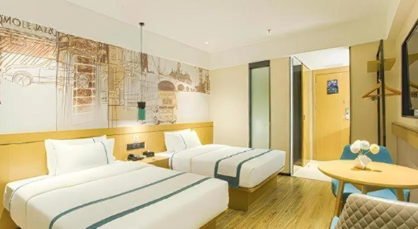 Bed in City Comfort Inn Wuzhou Sun Plaza Wanda