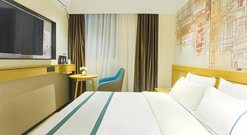 Bed in City Comfort Inn Wuzhou Sun Plaza Wanda