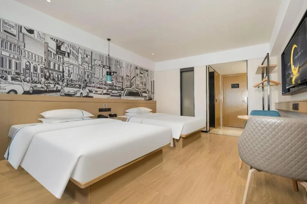 Bed in City Comfort Inn Wuzhou Sun Plaza Wanda