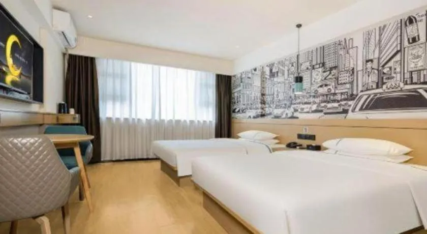 Bed in City Comfort Inn Wuzhou Sun Plaza Wanda
