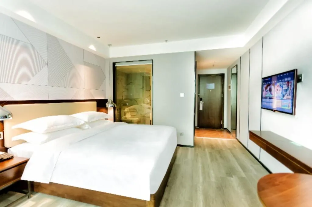 Bed in Borrman Hotel Yunfu Xinxing County Bus Station