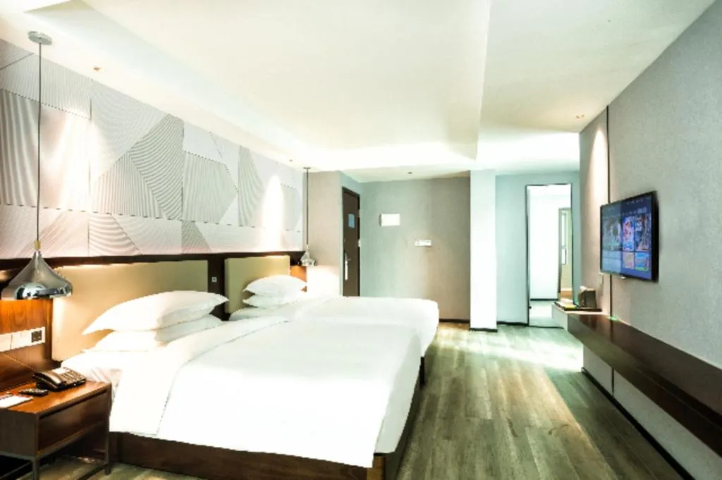 Bed in Borrman Hotel Yunfu Xinxing County Bus Station