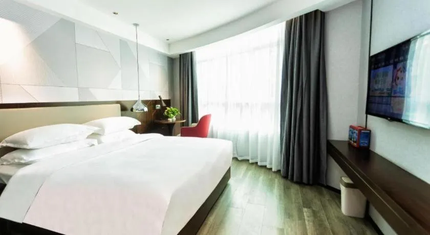 Bed in Borrman Hotel Yunfu Xinxing County Bus Station