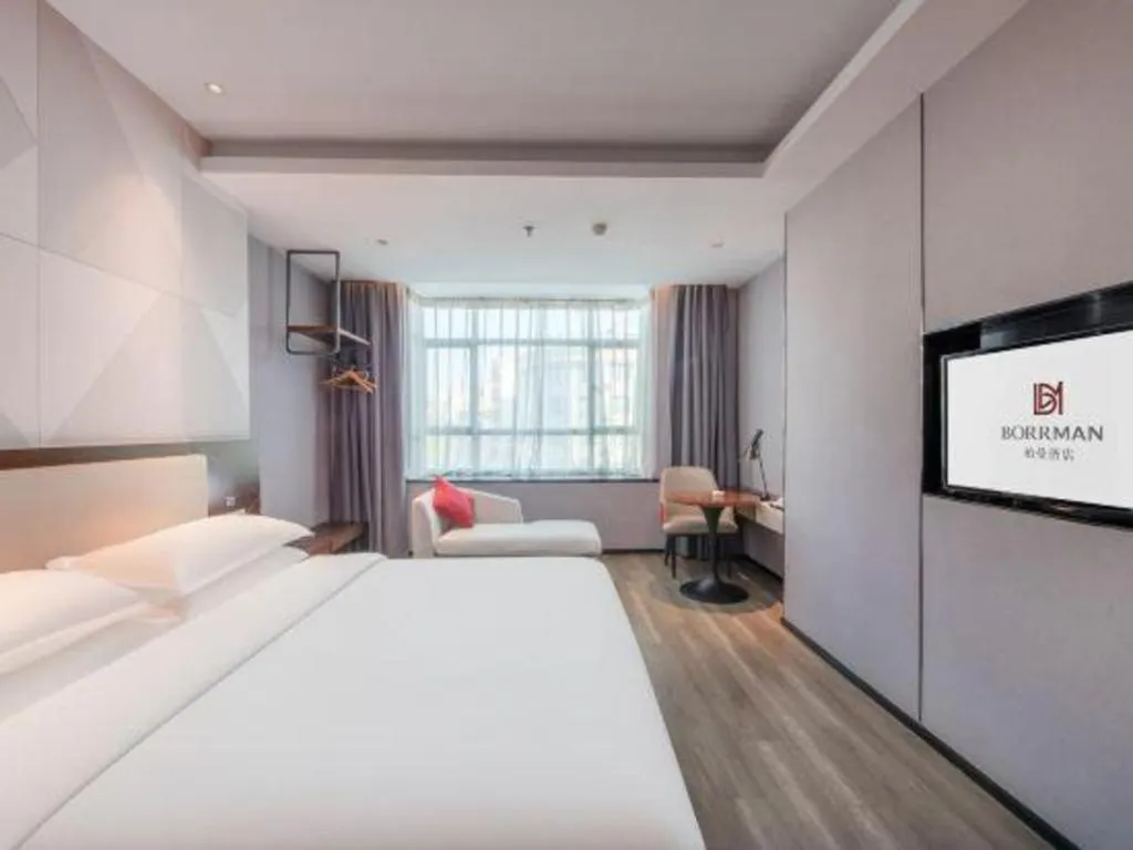 Bed in Borrman Hotel Yunfu Xinxing County Bus Station