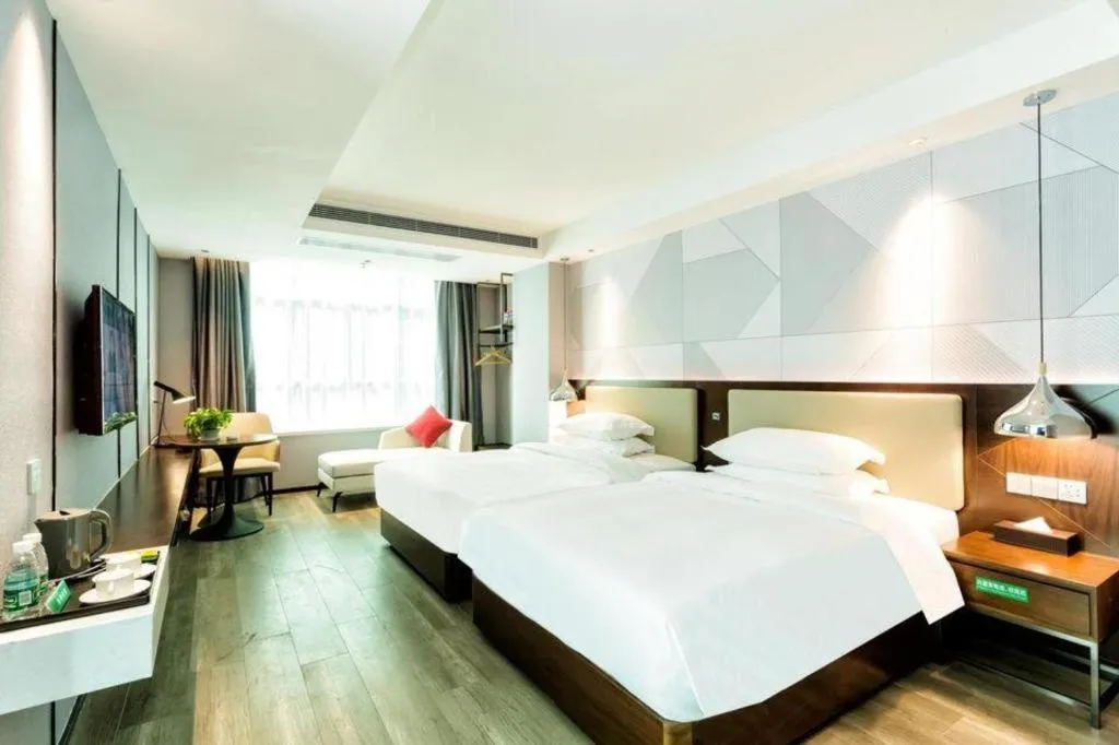 Bed in Borrman Hotel Yunfu Xinxing County Bus Station