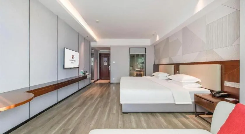 Bed in Borrman Hotel Yunfu Xinxing County Bus Station