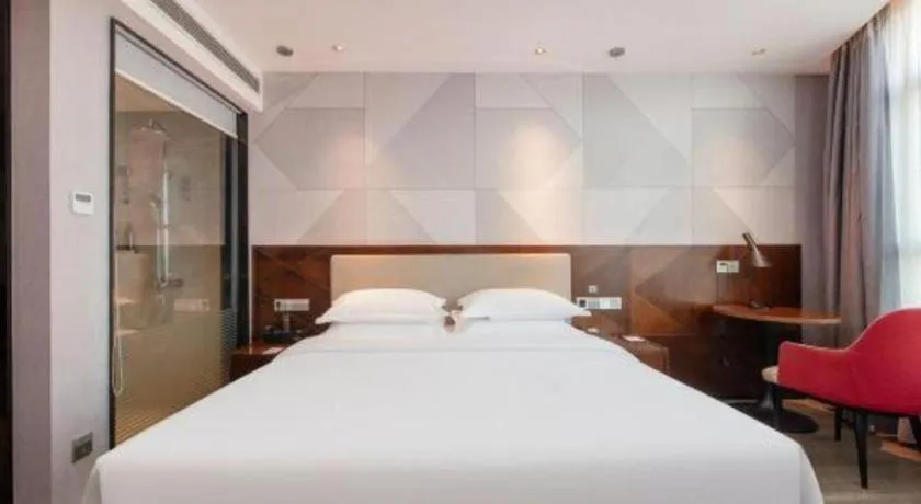 Bed in Borrman Hotel Yunfu Xinxing County Bus Station