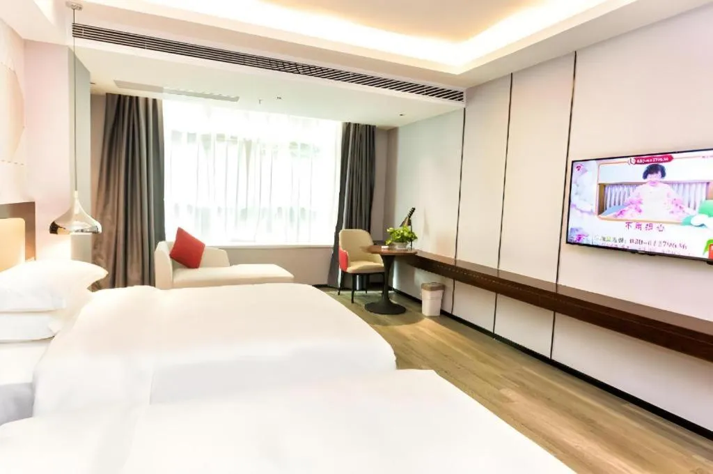 Bed in Borrman Hotel Yunfu Xinxing County Bus Station