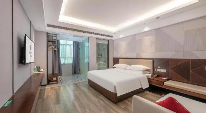 Bed in Borrman Hotel Yunfu Xinxing County Bus Station