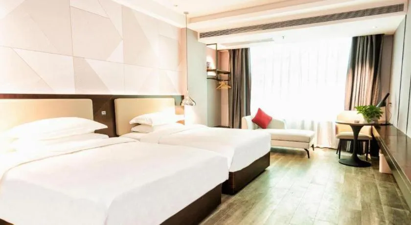 Bed in Borrman Hotel Yunfu Xinxing County Bus Station