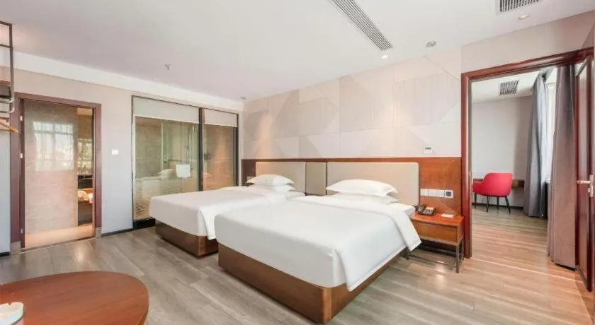 Bed in Borrman Hotel Yunfu Xinxing County Bus Station