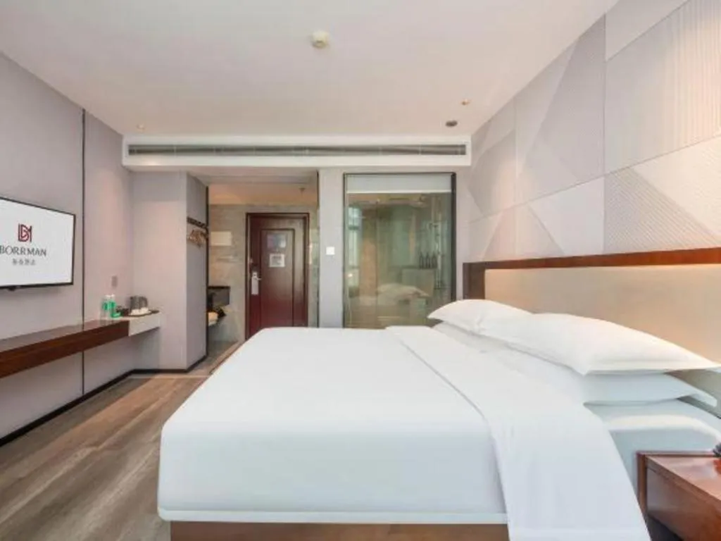 Bed in Borrman Hotel Yunfu Xinxing County Bus Station