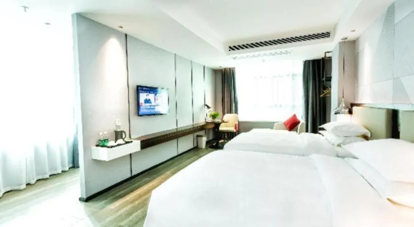 Bed in Borrman Hotel Yunfu Xinxing County Bus Station