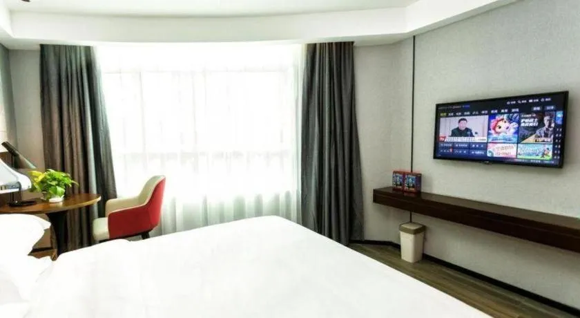 Bed in Borrman Hotel Yunfu Xinxing County Bus Station