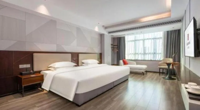 Bed in Borrman Hotel Yunfu Xinxing County Bus Station