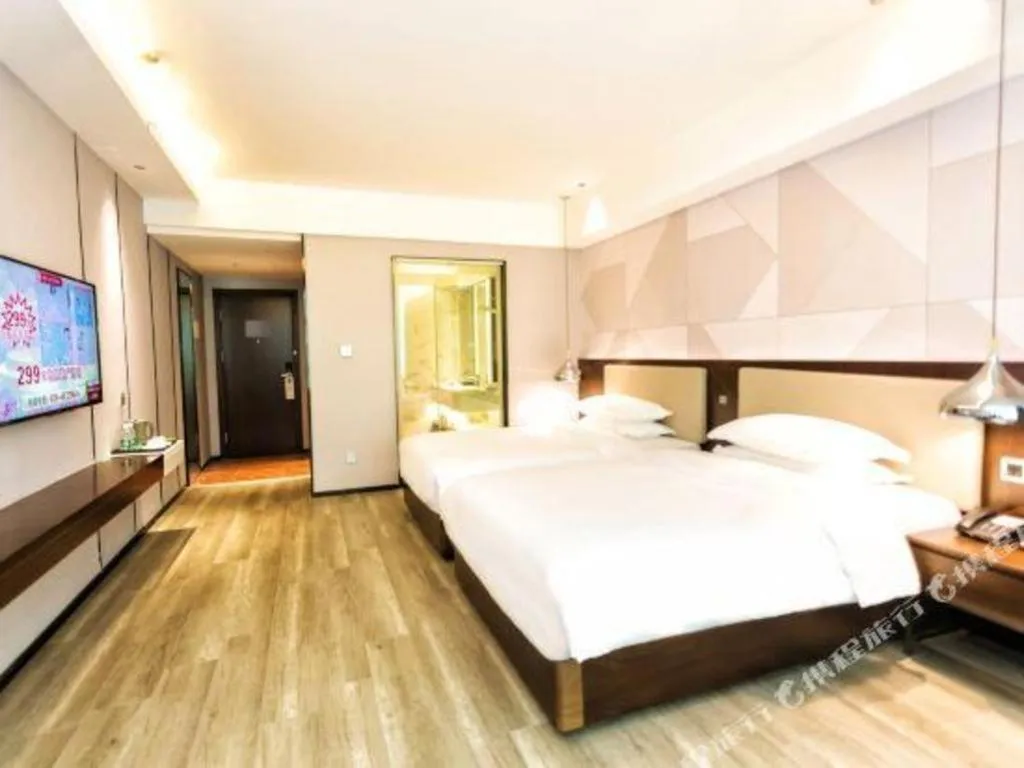 Bed in Borrman Hotel Yunfu Xinxing County Bus Station