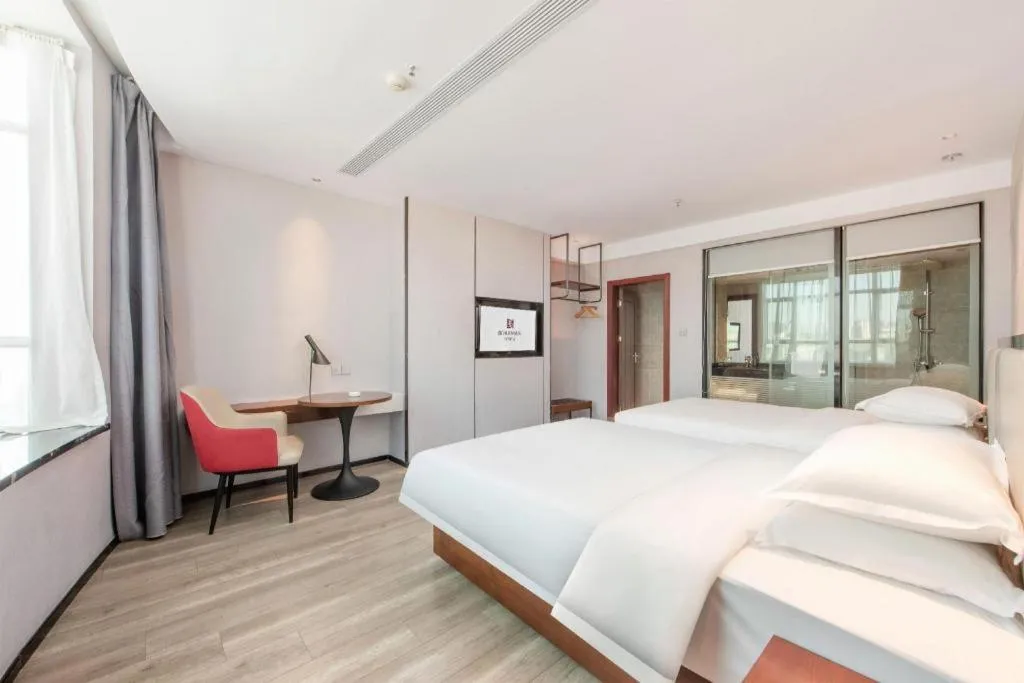 Bed in Borrman Hotel Yunfu Xinxing County Bus Station