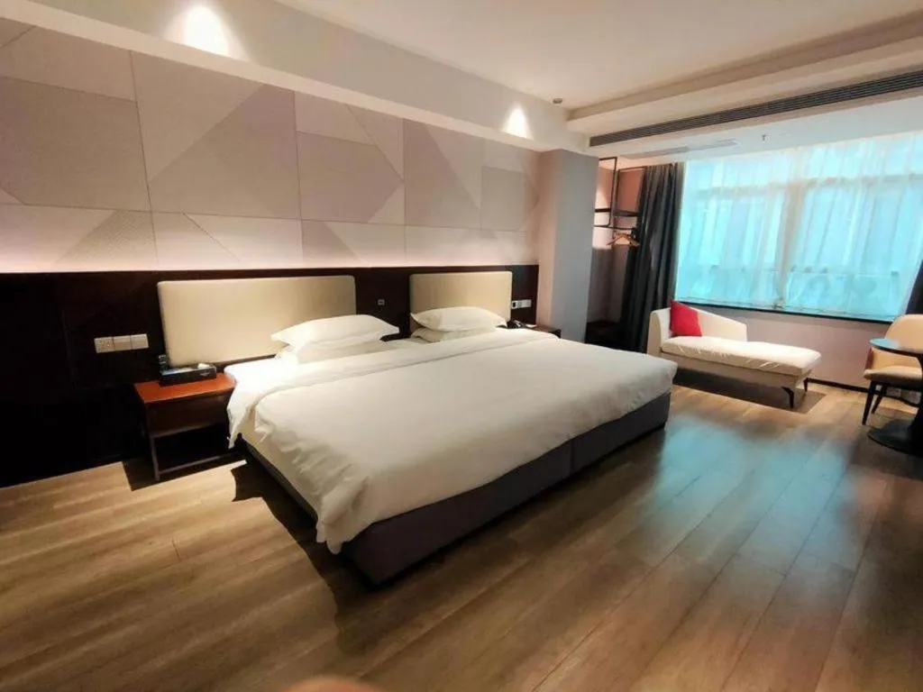 Bed in Borrman Hotel Yunfu Xinxing County Bus Station