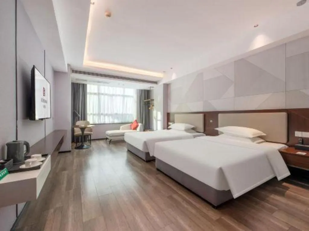 Bed in Borrman Hotel Yunfu Xinxing County Bus Station