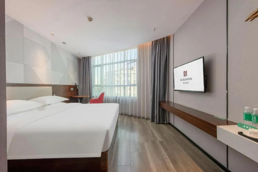 Bed in Borrman Hotel Yunfu Xinxing County Bus Station