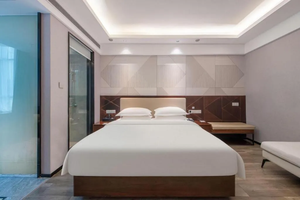 Bed in Borrman Hotel Yunfu Xinxing County Bus Station