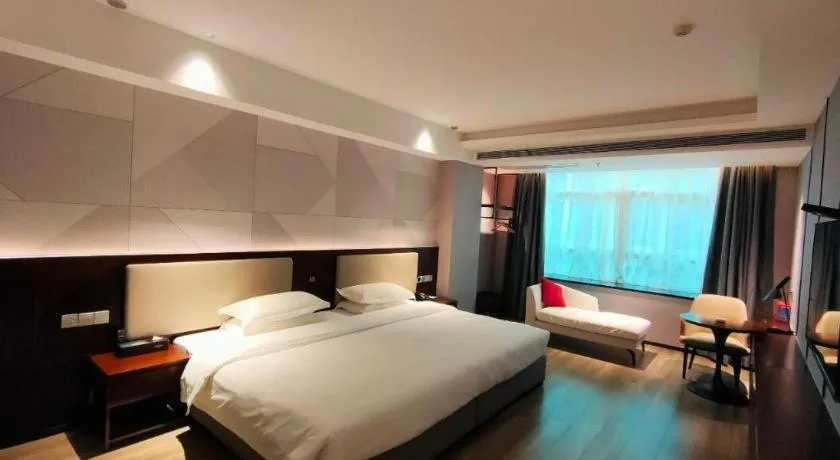 Bed in Borrman Hotel Yunfu Xinxing County Bus Station