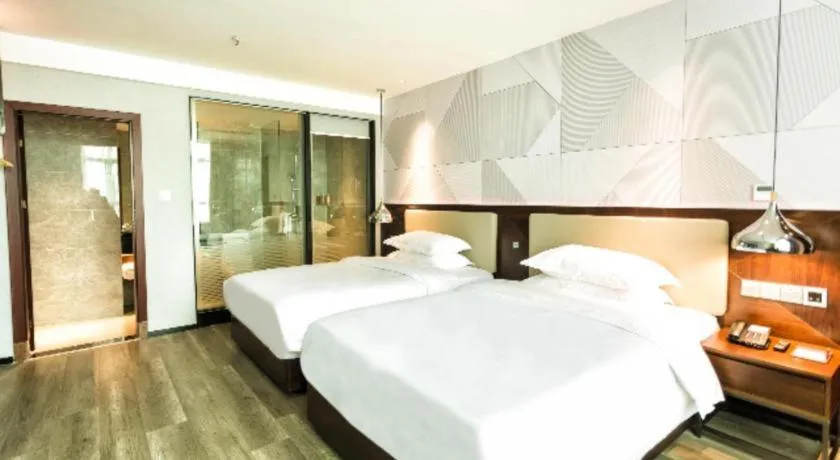 Bed in Borrman Hotel Yunfu Xinxing County Bus Station