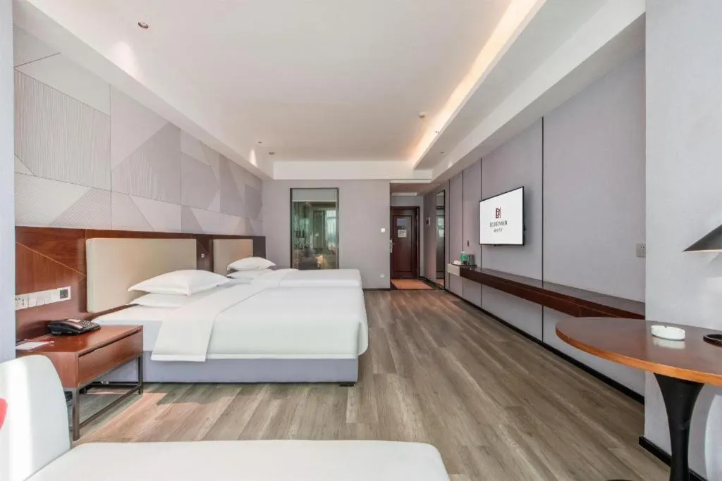 Bed in Borrman Hotel Yunfu Xinxing County Bus Station