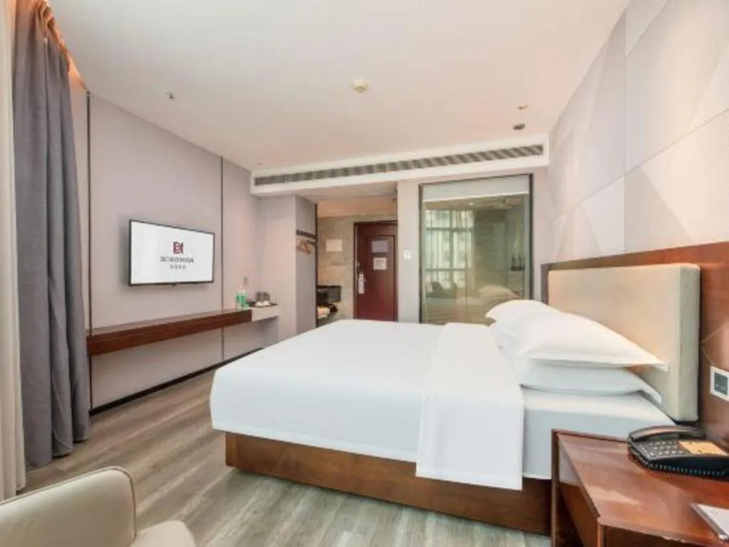 Bed in Borrman Hotel Yunfu Xinxing County Bus Station