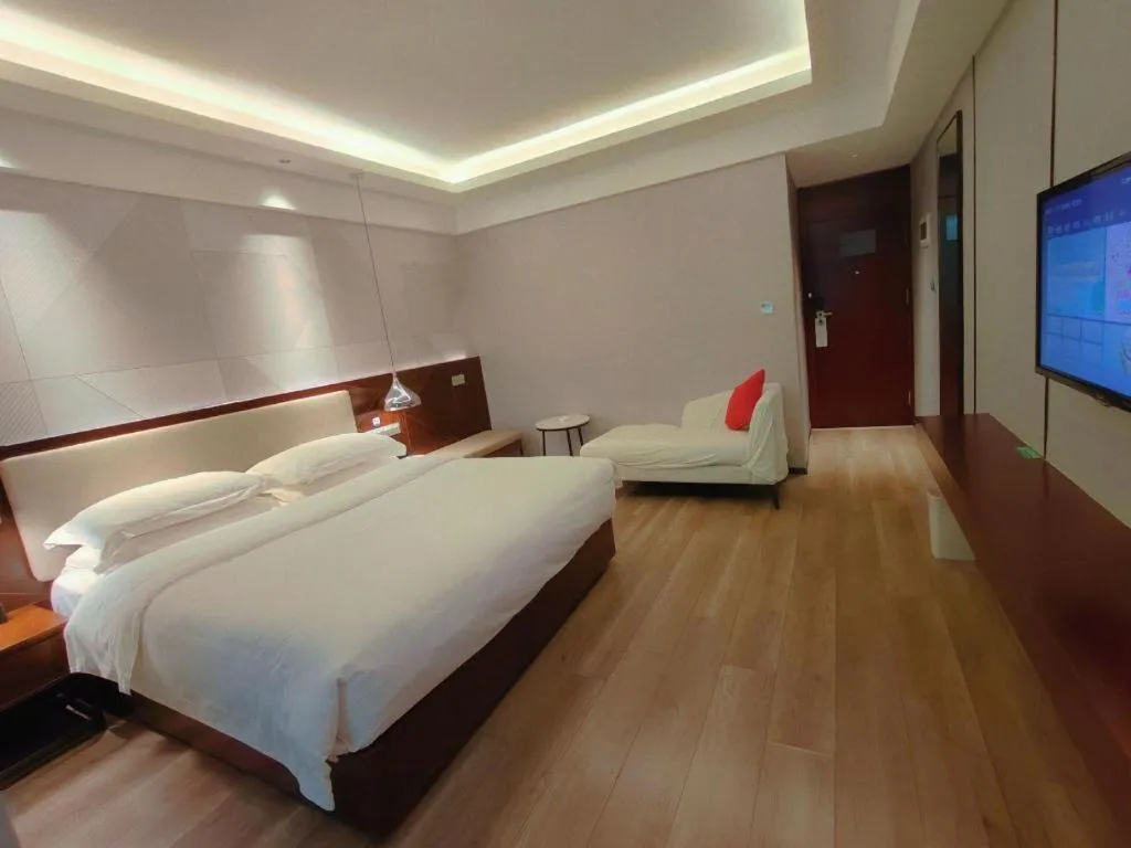 Bed in Borrman Hotel Yunfu Xinxing County Bus Station