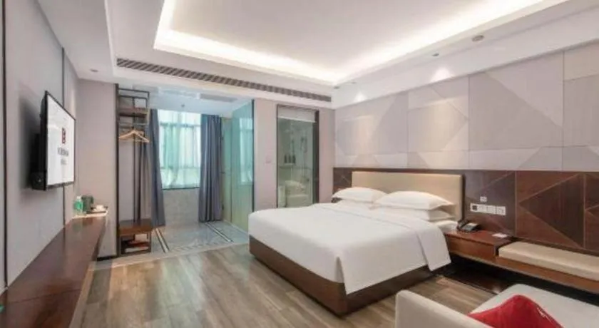 Bed in Borrman Hotel Yunfu Xinxing County Bus Station